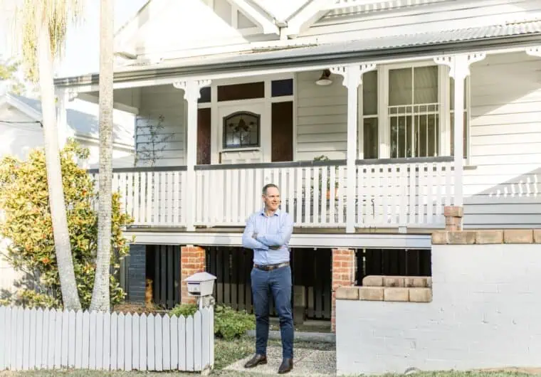 Sam Price, Sam Price, first home Buyer's Agent Brisbane, helping a first home buyer find the right property, outside a home he purchased in Auchenflower for a client