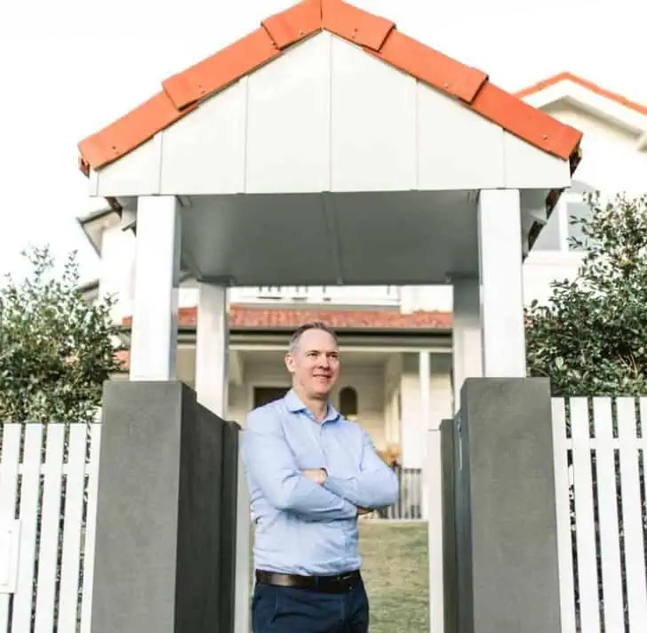 Sam Price, Brisbane Buyer's Agent, at the entrance of a Brisbane investment property